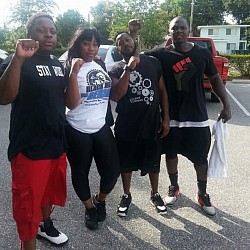 Glock,Alex, and Body Guard Zeus at a House Of Pharaoh rally